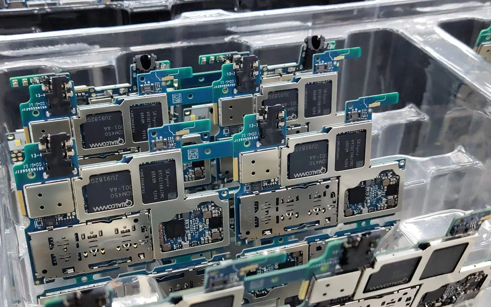 Circuit boards packed in trays at a Shenzhen electronics factory