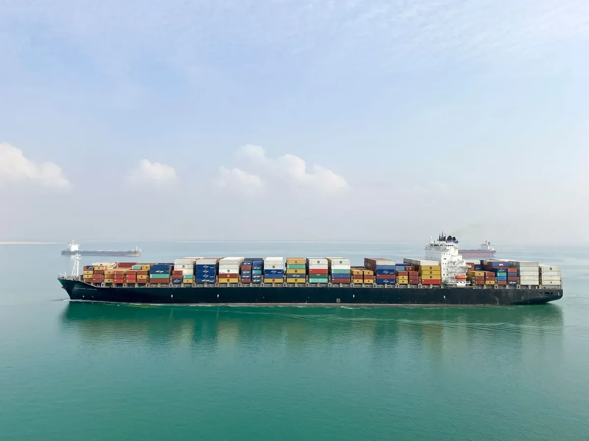 Container ship crossing the ocean from China to Chile