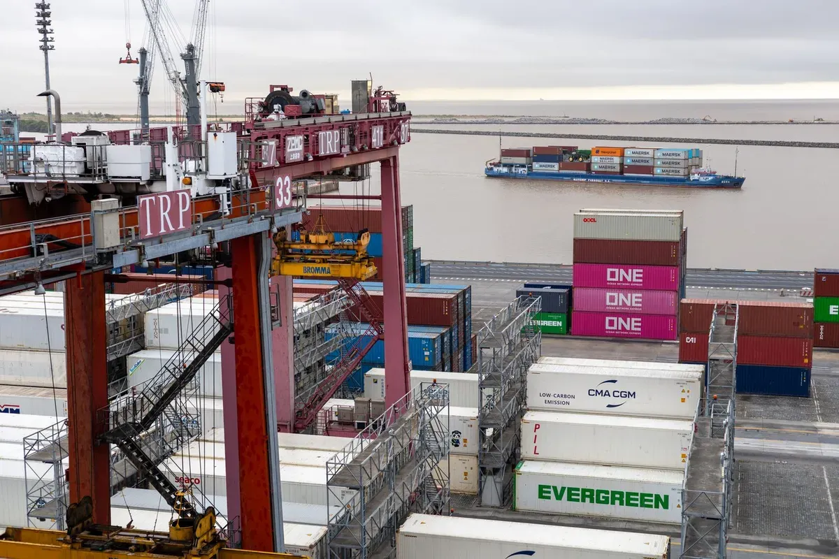 Stacked containers at the terminal awaiting customs release